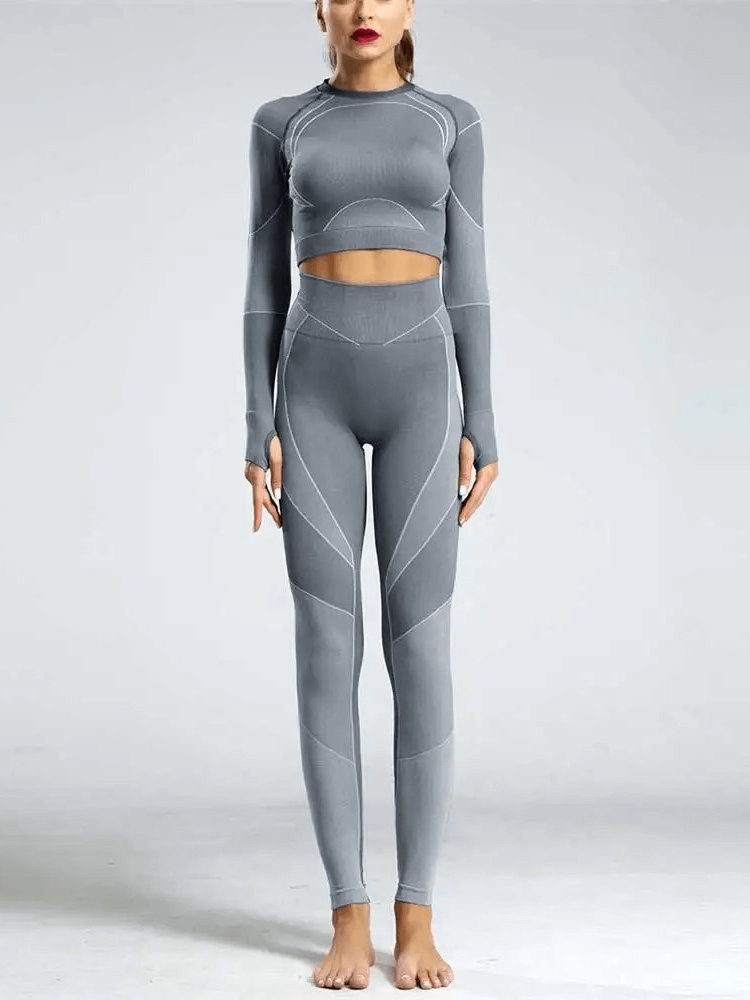 Breathable women's leggings and long sleeve top set, perfect for yoga and training, featuring a quick-dry geometric design.